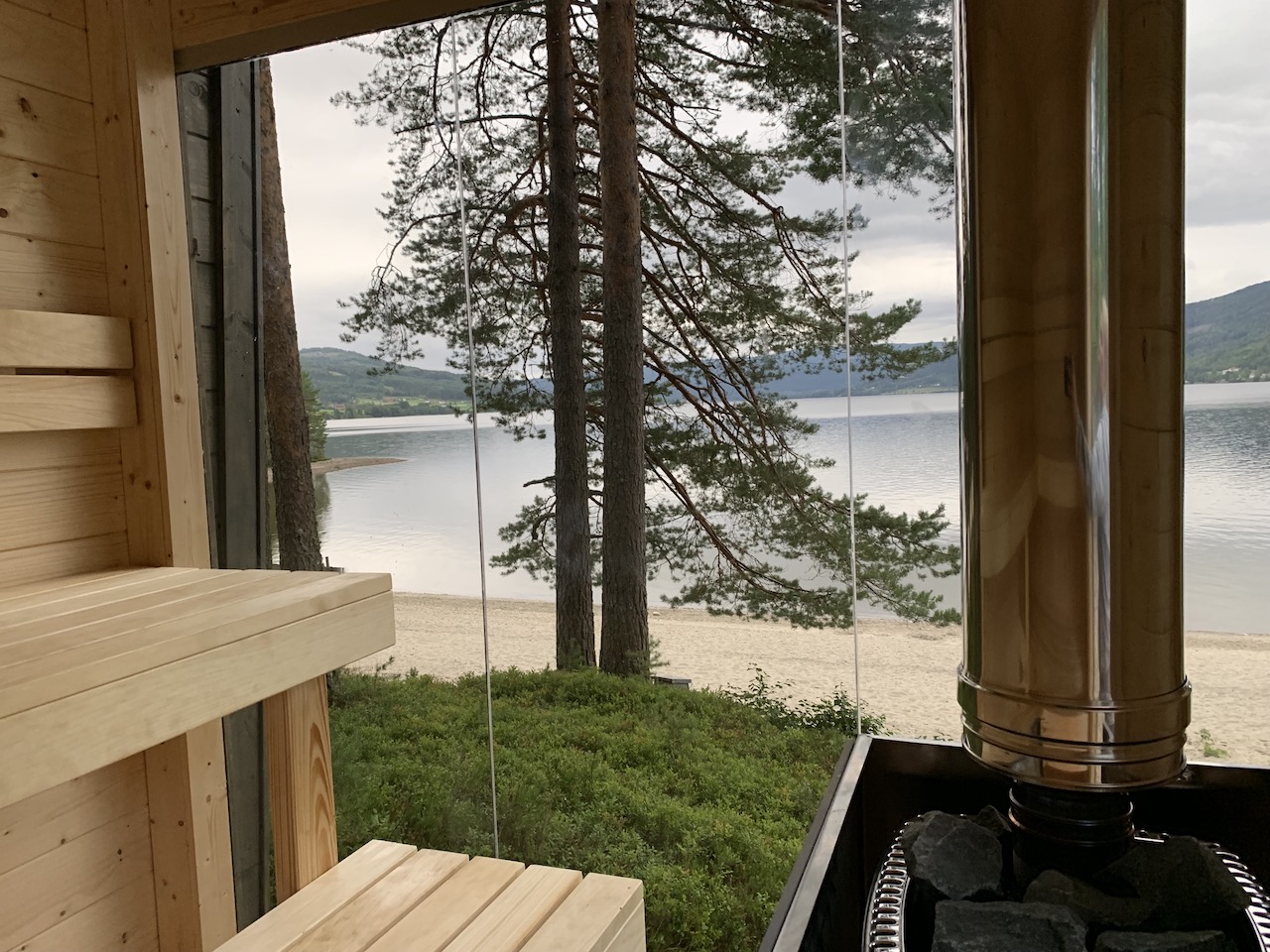 utsikt badstue strand fjord